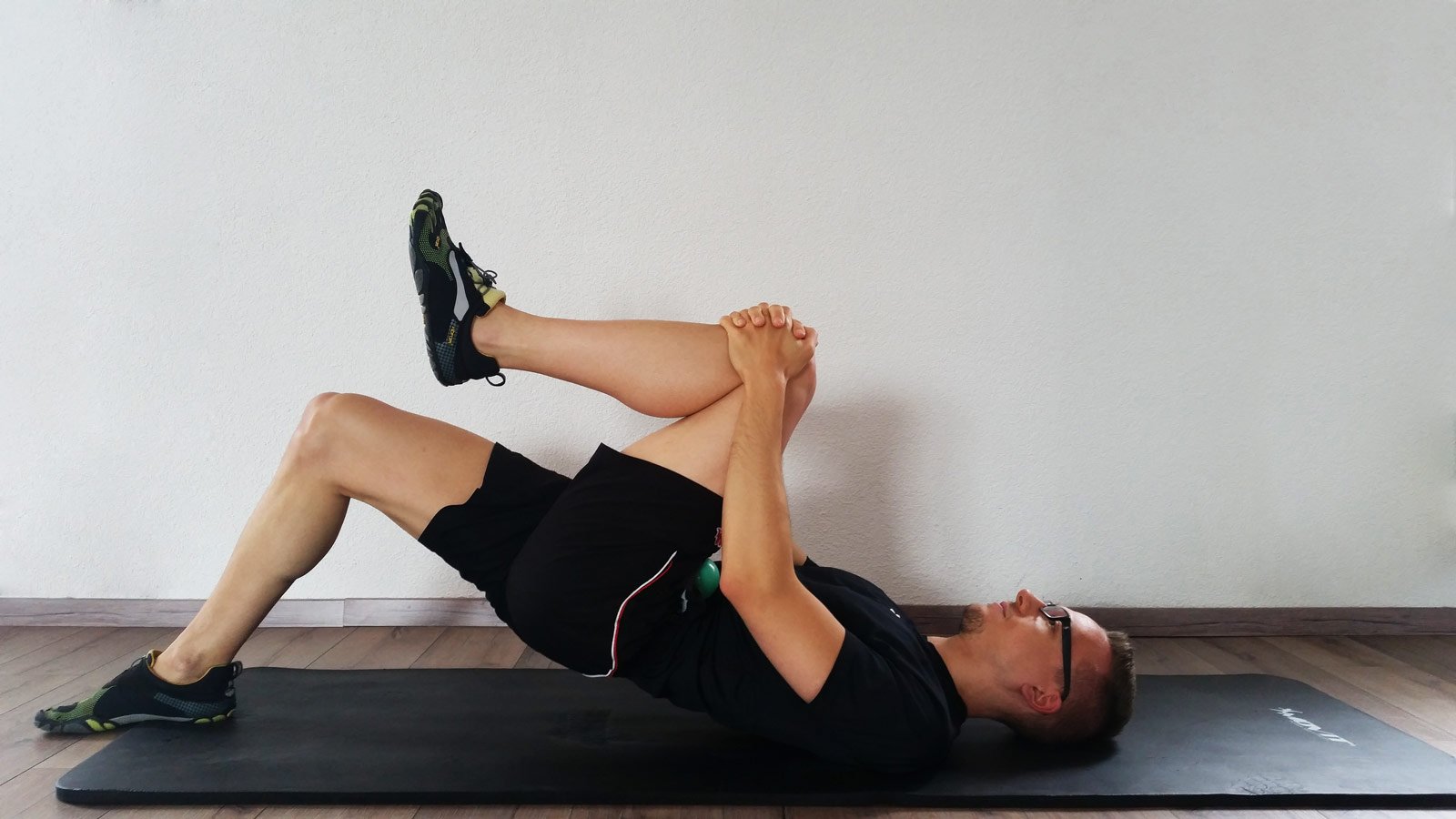 Cook Hip Lift Übungsausführung - Kontraktion des Gluteus